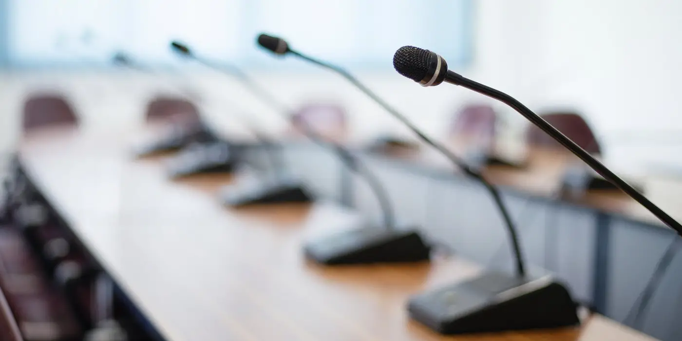 Conference Microphone placed on the table in the conference room, Close up.