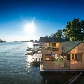 Luxury floating house, raft cottage on river